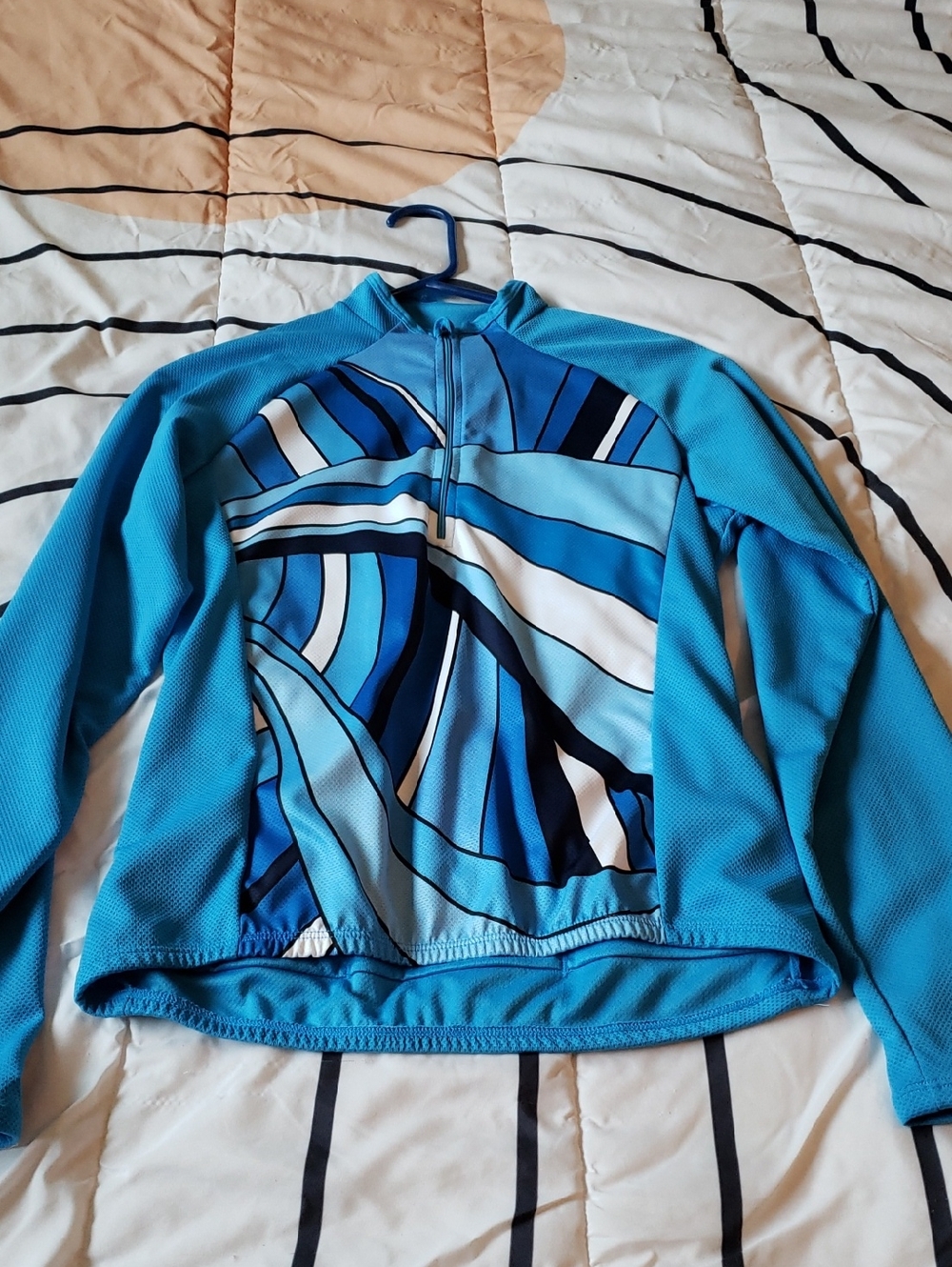 SUGOI Bright Blue Cycling Top with Subtle Logo